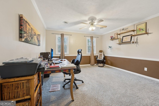 office space featuring crown molding, carpet floors, and ceiling fan