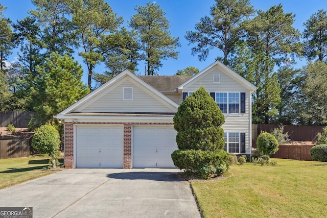 view of front facade featuring a front yard and a garage