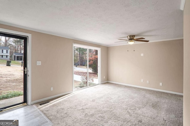 unfurnished room featuring crown molding, ceiling fan, and a textured ceiling