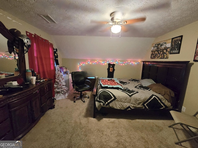 bedroom featuring lofted ceiling, ceiling fan, light carpet, and a textured ceiling