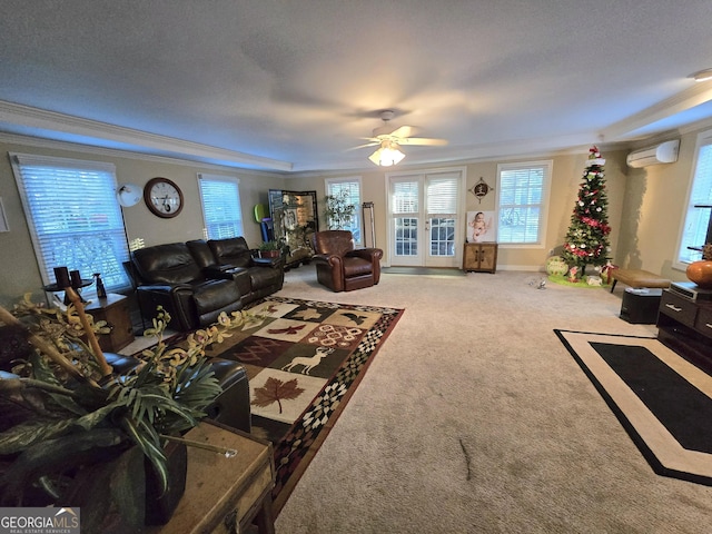 living room featuring carpet, a wall unit AC, ceiling fan, and ornamental molding