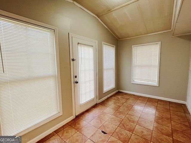 entryway featuring vaulted ceiling and a healthy amount of sunlight