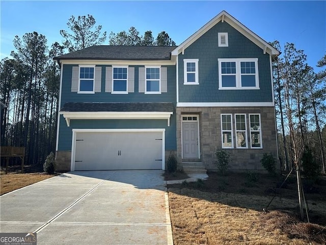 view of front of property with a garage