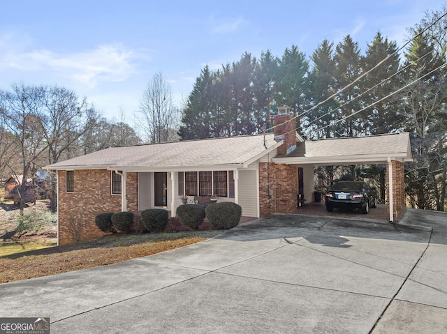 ranch-style house with a carport