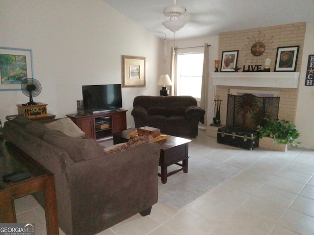 living room with a brick fireplace