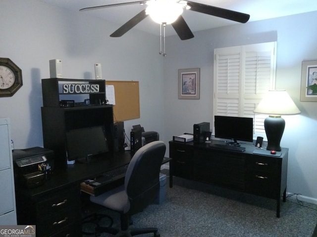 office area with ceiling fan and light carpet