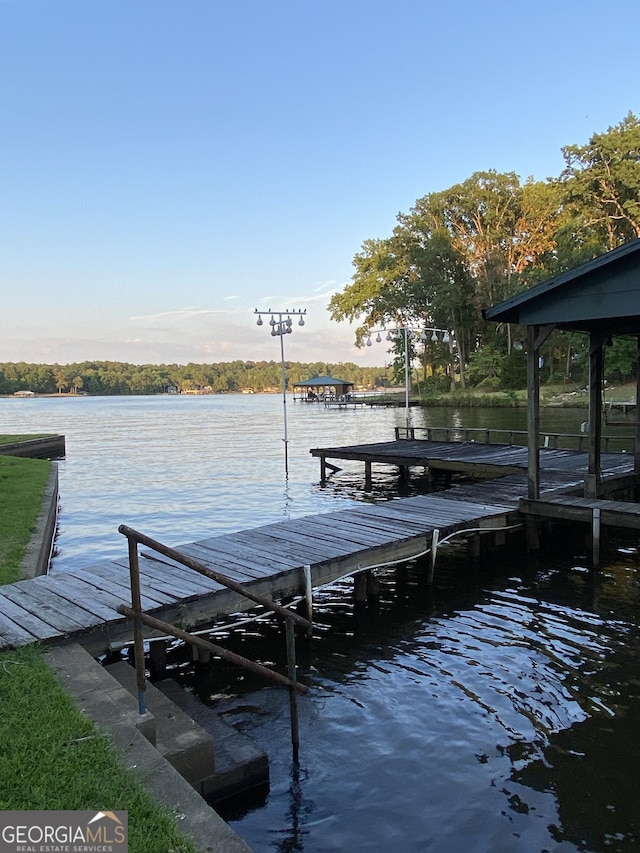 dock area featuring a water view