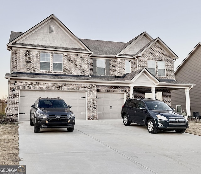 view of front of property featuring a garage