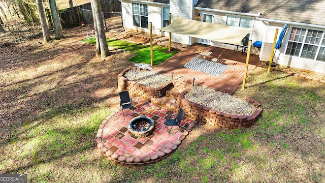 view of yard featuring a fire pit and a patio area