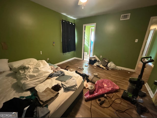 bedroom featuring hardwood / wood-style floors