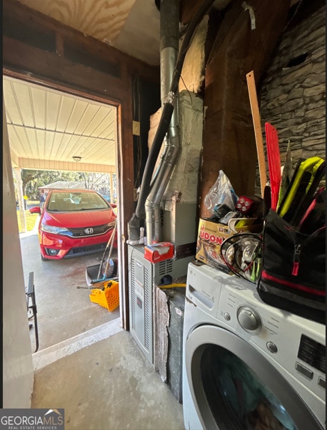 laundry room featuring washer / dryer