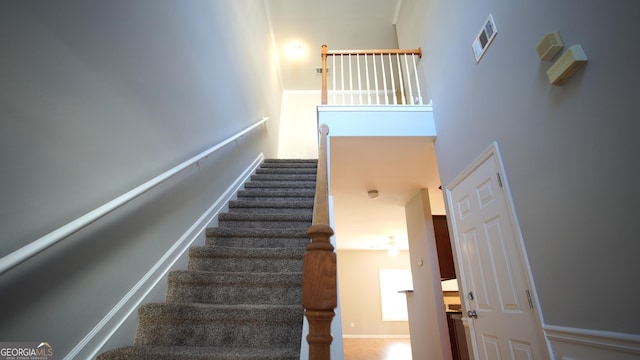 stairs with a towering ceiling