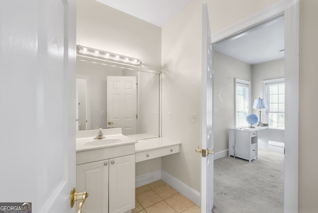 bathroom with vanity and tile patterned floors