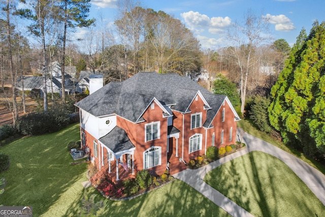 exterior space featuring a front yard