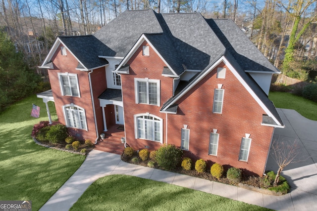 view of front property with a front lawn