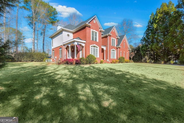 view of front of house with a front lawn