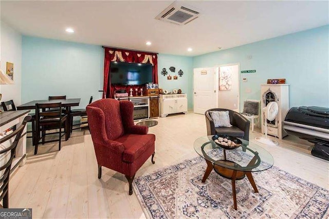 living room featuring light hardwood / wood-style floors