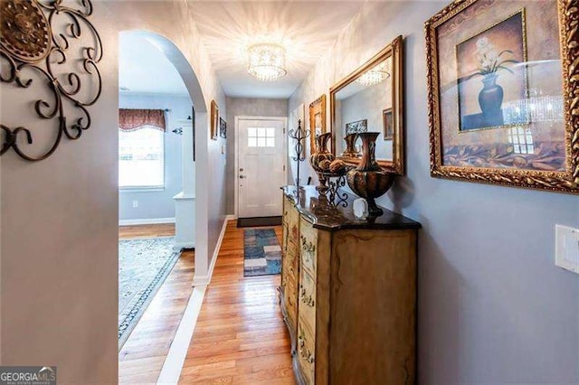 entryway with light hardwood / wood-style floors