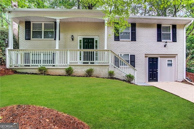 view of front of property with a porch and a front yard