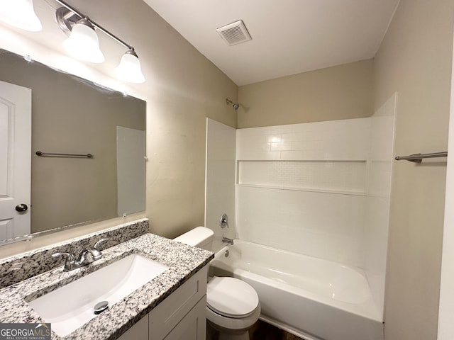 full bathroom with vanity,  shower combination, and toilet