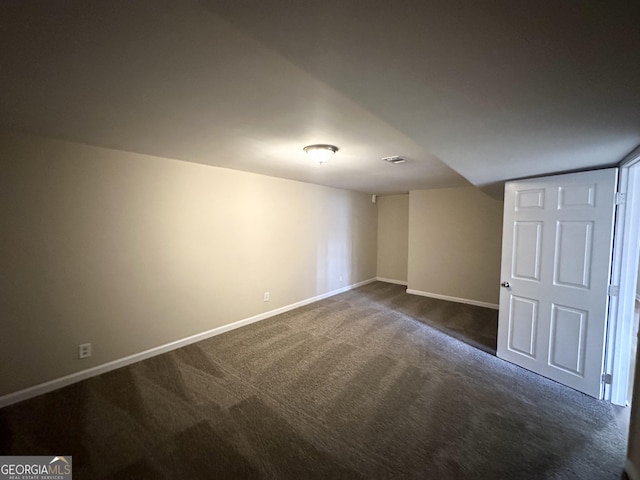 interior space with dark carpet