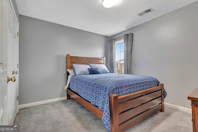 carpeted bedroom featuring a closet