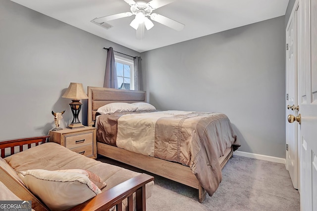 carpeted bedroom featuring ceiling fan