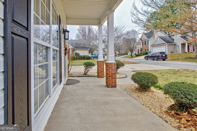 view of patio featuring a porch