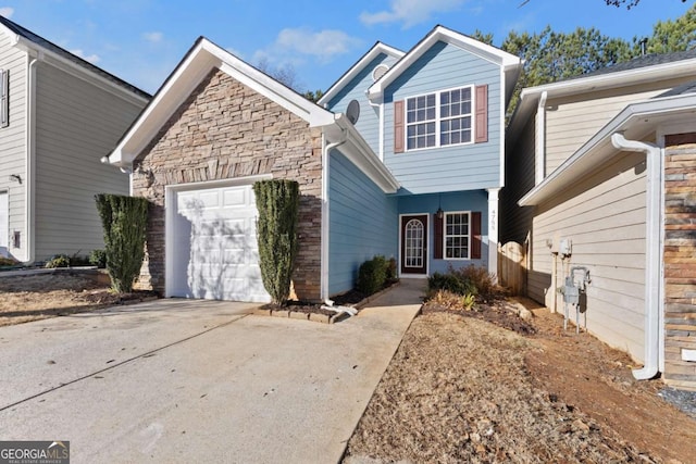 front of property featuring a garage