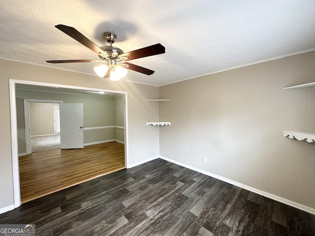 unfurnished room featuring a textured ceiling, dark hardwood / wood-style floors, ceiling fan, and crown molding