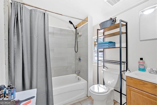 full bathroom featuring tile patterned flooring, vanity, toilet, and shower / bath combo with shower curtain