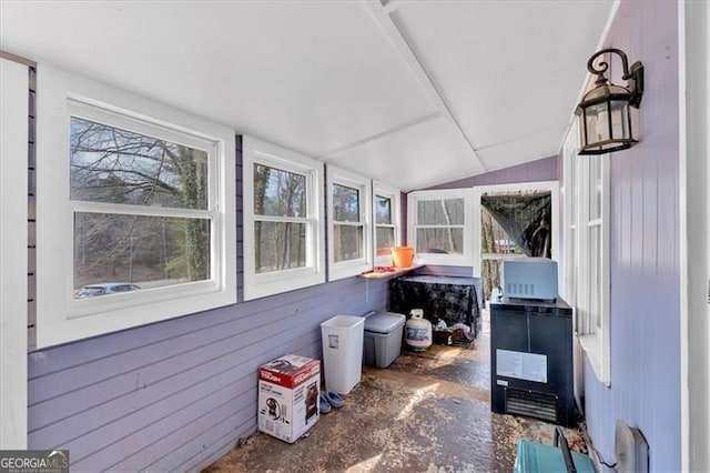 sunroom / solarium with lofted ceiling