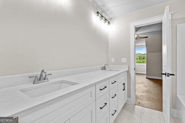 bathroom with vanity and ceiling fan