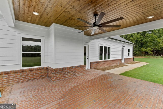 view of patio / terrace featuring ceiling fan