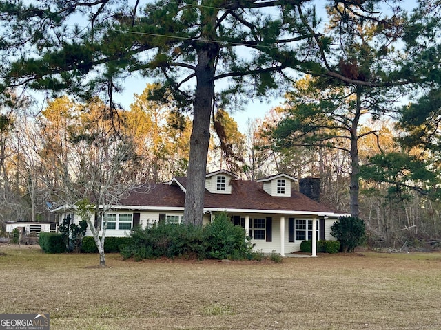 view of new england style home