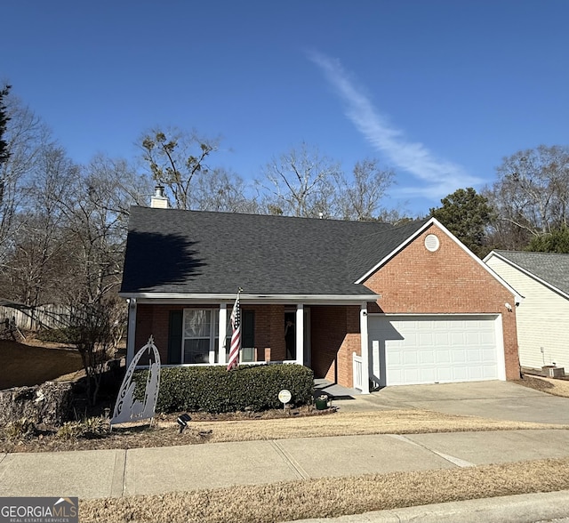 view of front of home with a porch and a garage