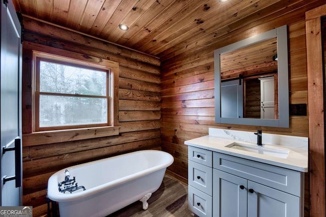 bathroom featuring vanity, wooden ceiling, log walls, wood-type flooring, and a tub