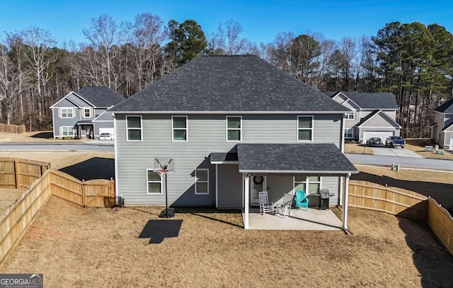 rear view of property with a patio