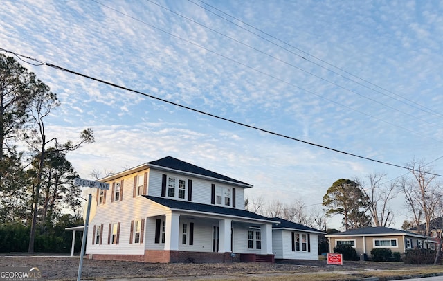 view of front of property featuring covered porch