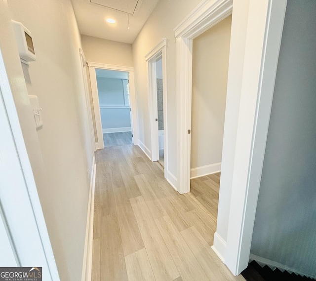 hallway featuring light wood-type flooring