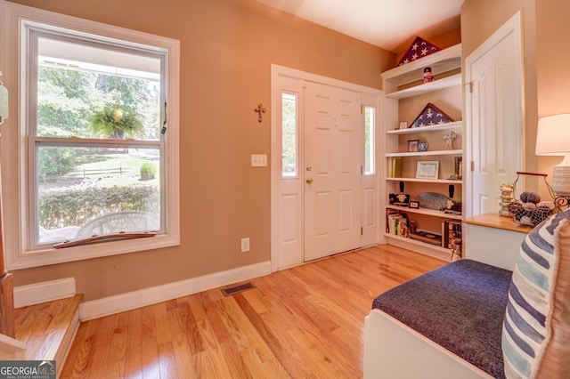 entrance foyer featuring light hardwood / wood-style floors