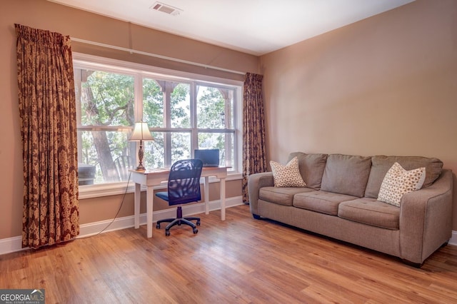 office space featuring hardwood / wood-style floors