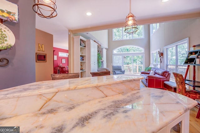 kitchen featuring a chandelier and hanging light fixtures