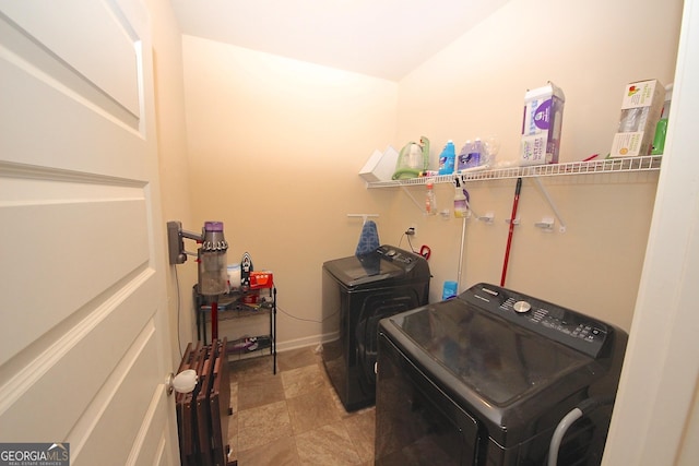 laundry room featuring independent washer and dryer