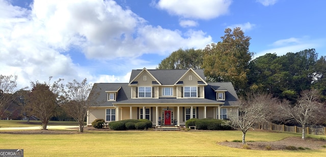 view of front of home featuring a porch and a front lawn