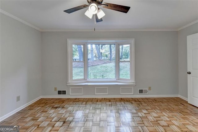 spare room with ceiling fan and ornamental molding