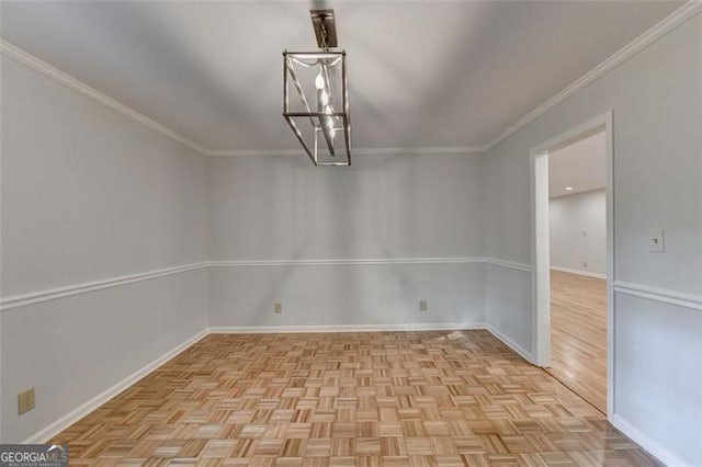 unfurnished dining area with crown molding, light parquet floors, and an inviting chandelier