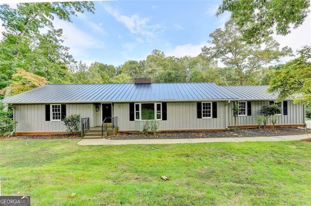 single story home with a front yard