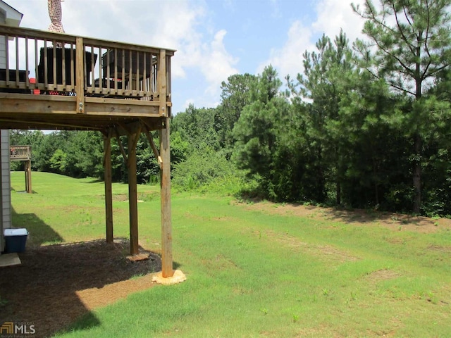 view of yard featuring a deck