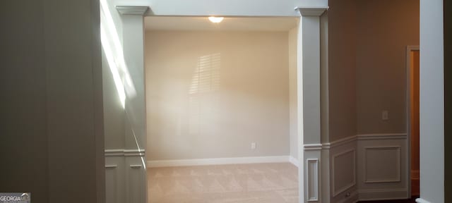 interior space featuring light colored carpet